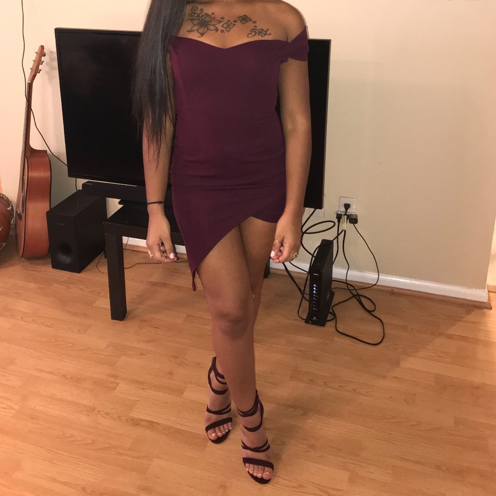 asymmetrical, off the shoulder mini dress.